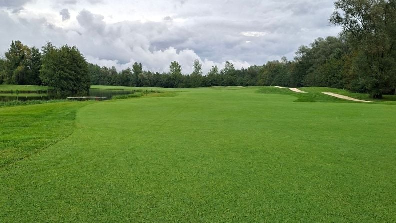 Golf fairway at Asolo Golf Club showing a dense, uniform playing surface established with ProSelect Rio Bermudagrass.