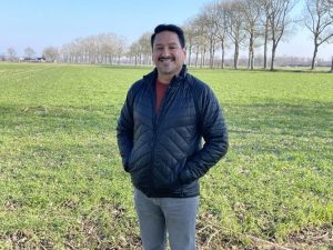 Cristian Terrones in a field in the Netherlands